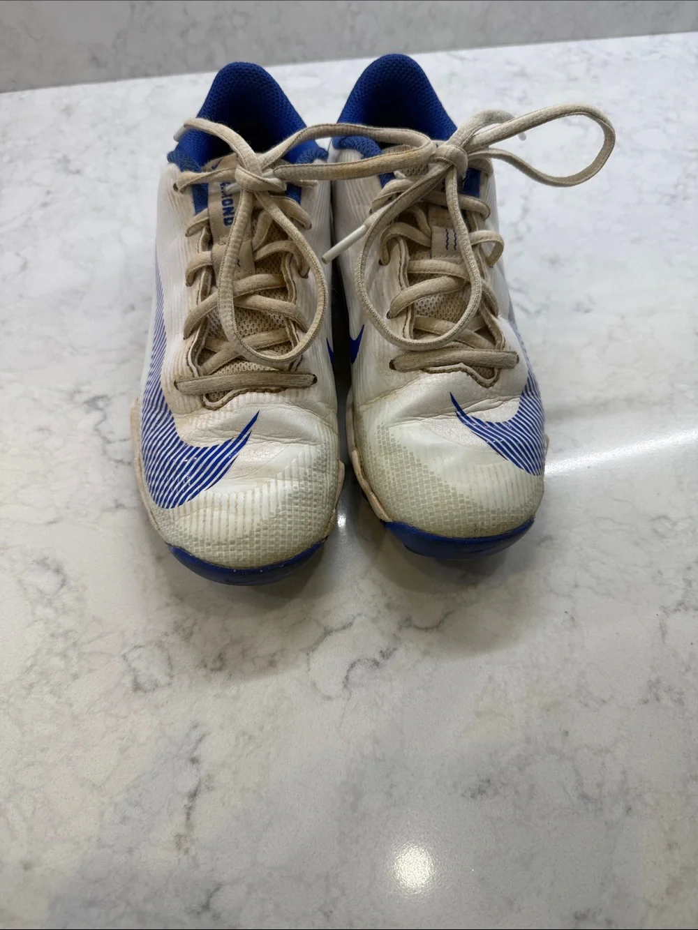 Nike Kids White and Blue Cleats, Size 2